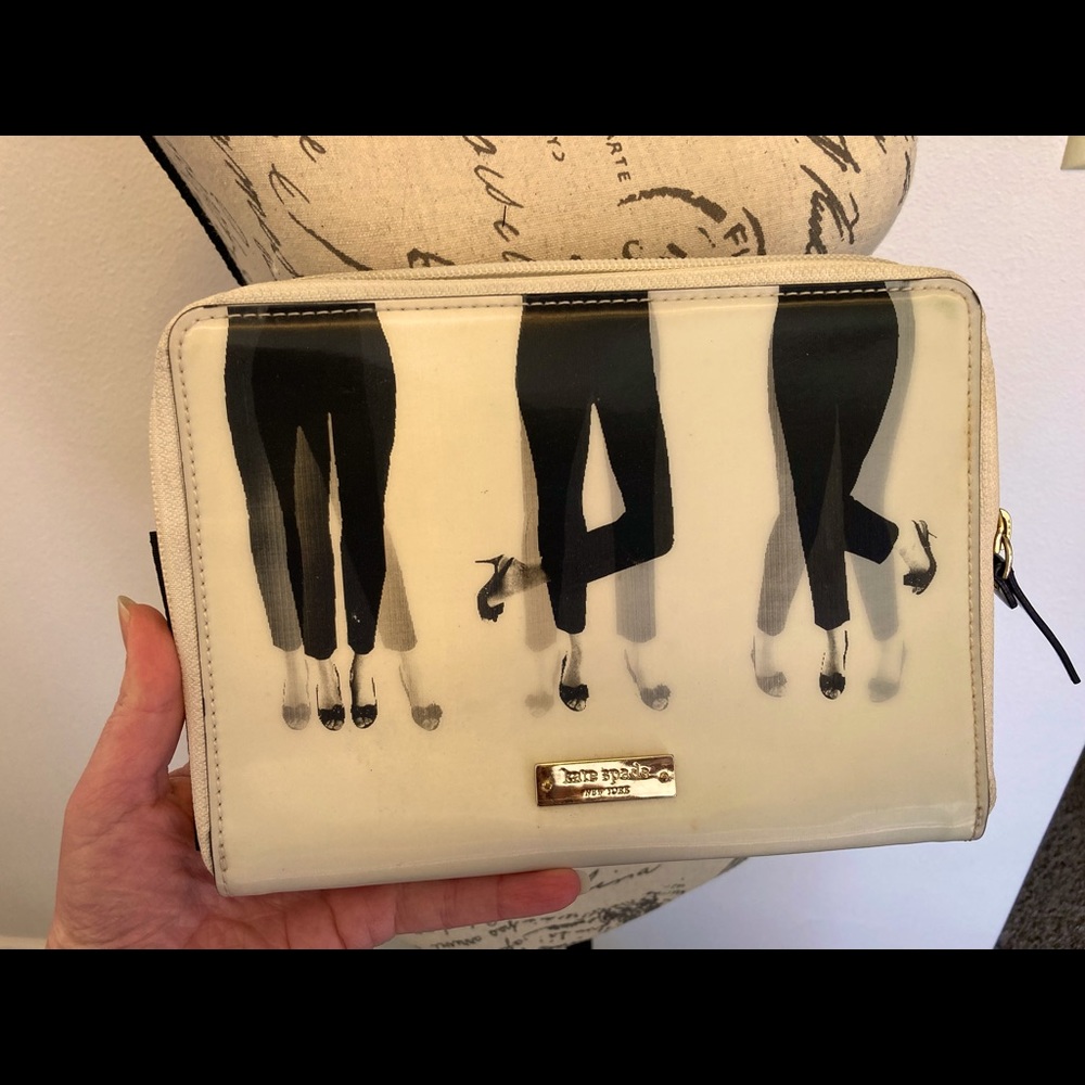 Cream colored “dancing” legs Kate Spade New York iPad mini sleeve